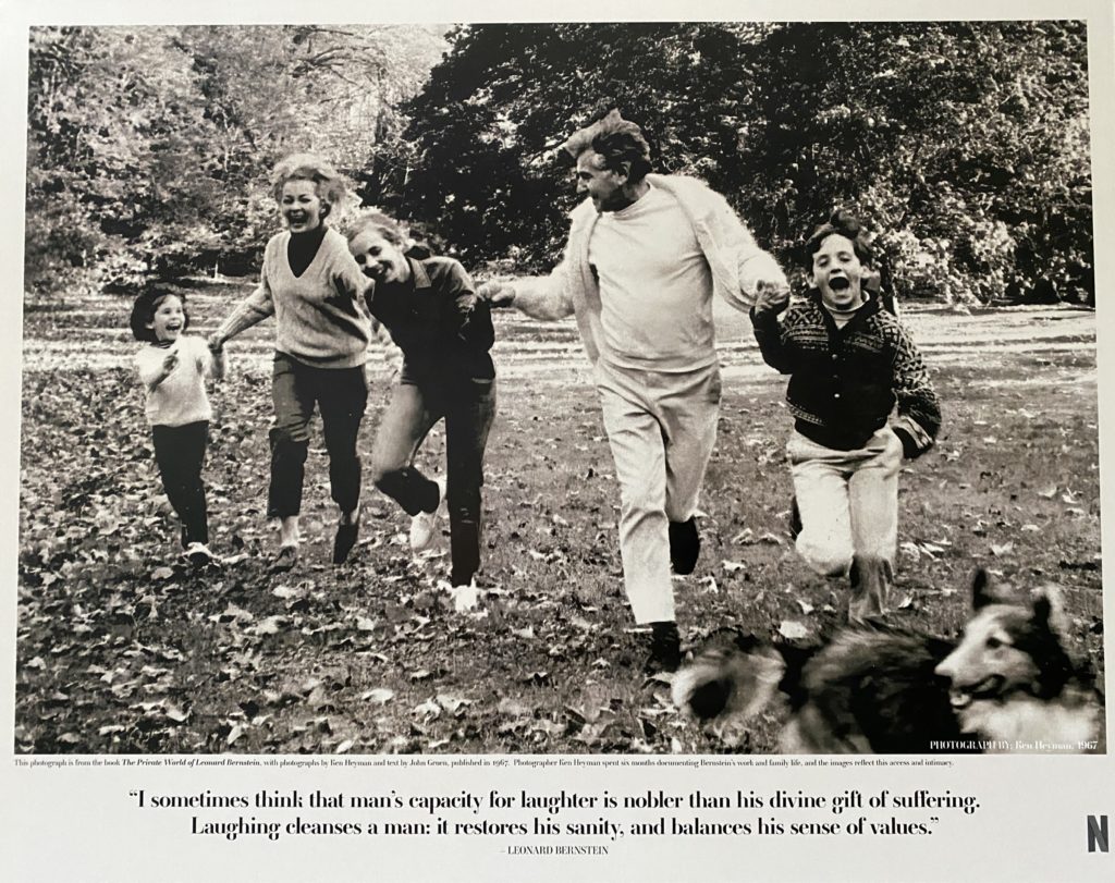 Image of Leonard Bernstein and his family running in their garden