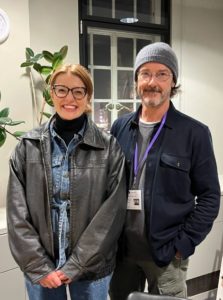 Julian Leeks, the writer and presenter of the A Land Without Music podcast standing next to Jess Gillam